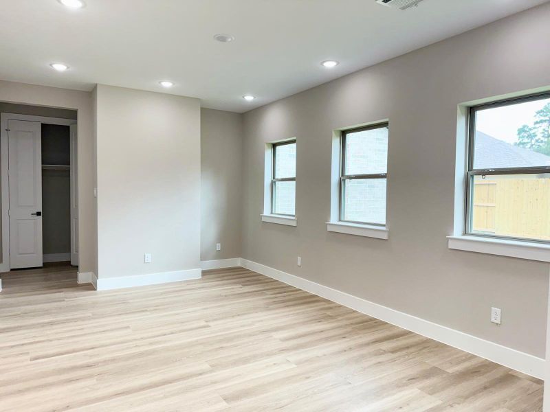Bright and spacious dining area with abundant natural light and elegant flooring, perfect for hosting gatherings.