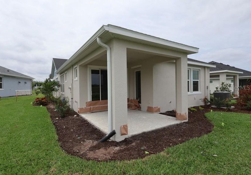 Exterior details and patio area of a home in Gracewater at Sarasota, Sarasota (Image 4). Exterior details and patio area of a home in Gracewater at Sarasota, Sarasota (Image 4).