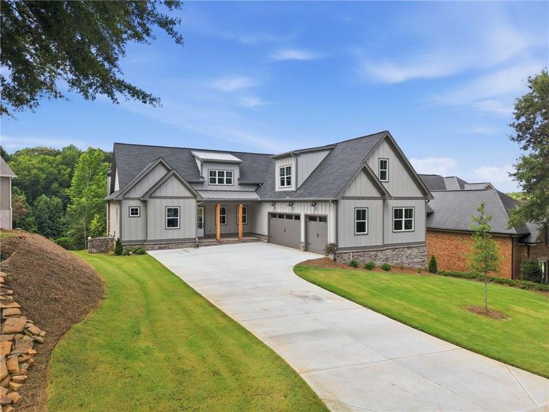 Front exterior of a new home in , Jefferson, GA, highlighting curb appeal (Image 31).