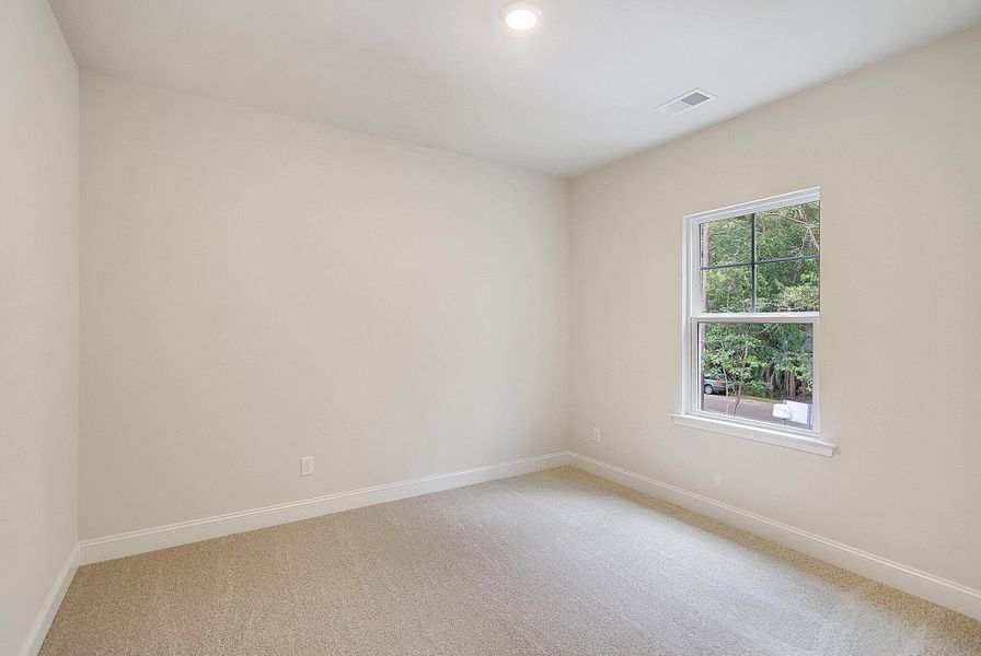 Spacious, unfurnished interior of a new home in Founder's Park, Lincolnville (Image 26).