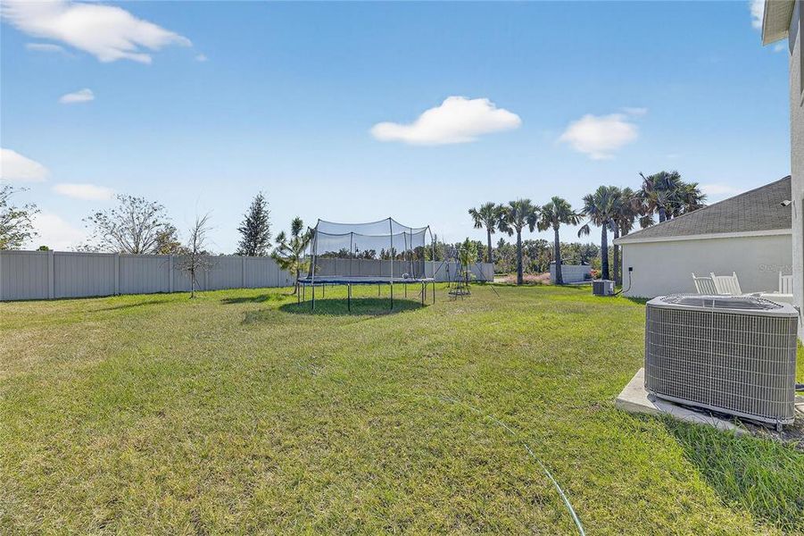 Exterior details and patio area of a home in North Park Isle, Plant City (Image 21).