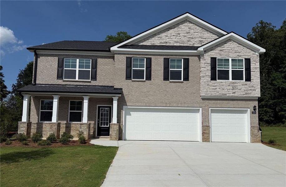 Front exterior of a new home in Independence, Loganville, GA, highlighting curb appeal (Image 1). Front exterior of a new home in Independence, Loganville, GA, highlighting curb appeal (Image 1).