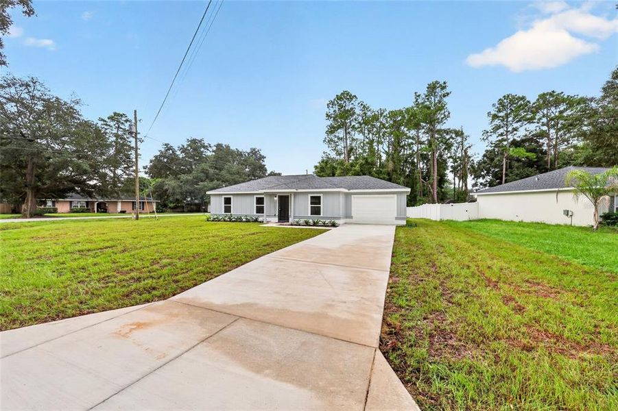 Front exterior of a new home in , Ocala, FL, highlighting curb appeal (Image 17). Front exterior of a new home in , Ocala, FL, highlighting curb appeal (Image 17).