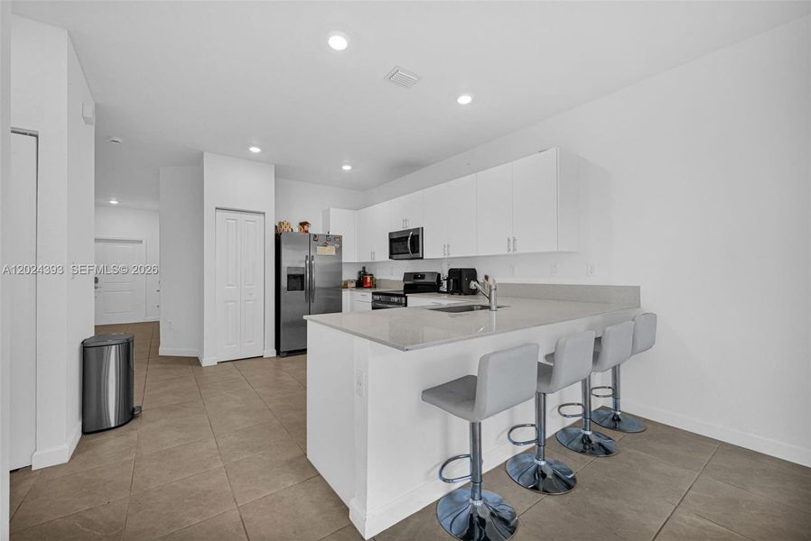 Furnished interior view inside a new home in , Miami (Image 17). Furnished interior view inside a new home in , Miami (Image 17).