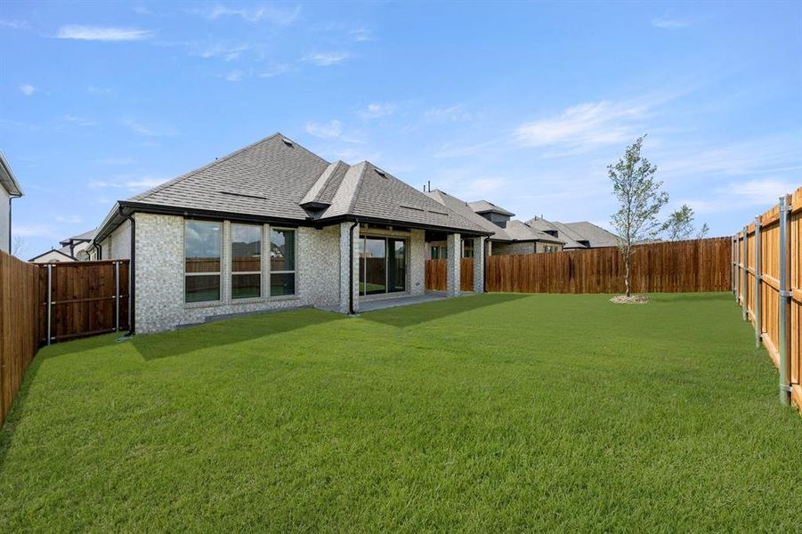 Front exterior of a new home in Brookfield, Melissa, TX, highlighting curb appeal (Image 24). Front exterior of a new home in Brookfield, Melissa, TX, highlighting curb appeal (Image 24).