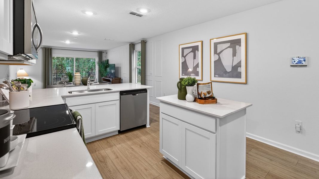 Representative furnished interior of a home built from the Carson by D.R. Horton in Hansen Creek, Jacksonville (Image 6).