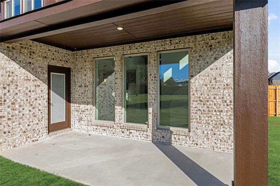 Exterior details and patio area of a home in Crystal Lake Estates, Red Oak (Image 17). Exterior details and patio area of a home in Crystal Lake Estates, Red Oak (Image 17).