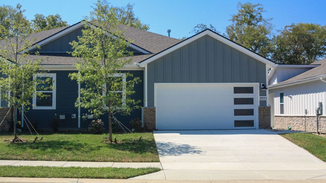 Front exterior of a new home in Nexus South, Gallatin, TN, highlighting curb appeal (Image 21). Front exterior of a new home in Nexus South, Gallatin, TN, highlighting curb appeal (Image 21).