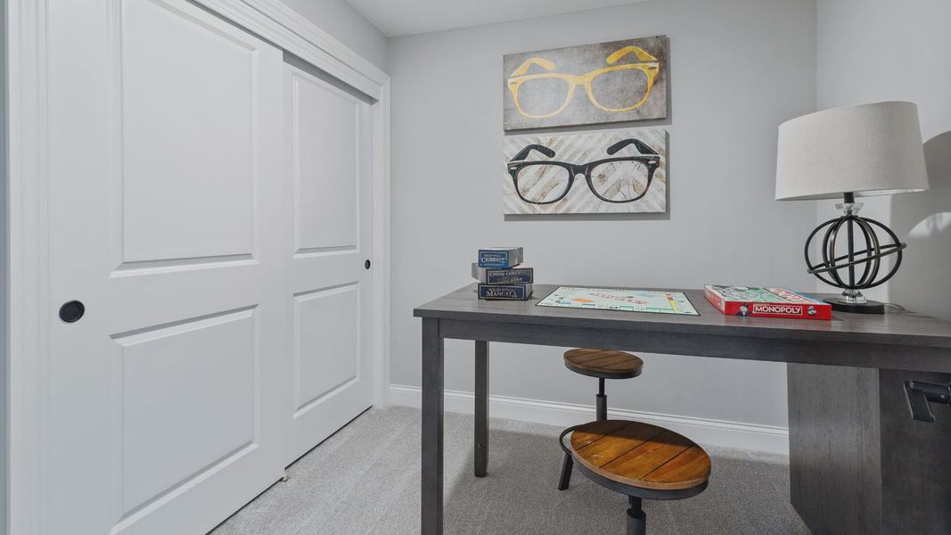 Representative furnished interior of a home built from the Cambridge by Epcon Communities in The Courtyards at Oak Grove, Durham (Image 34).