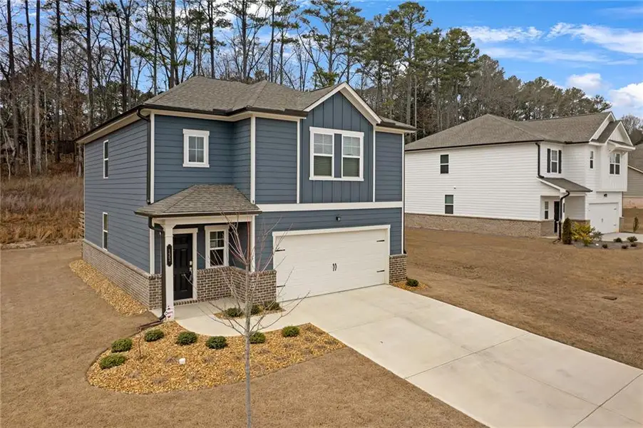 Front exterior of a new home in , Adairsville, GA, highlighting curb appeal (Image 27). Front exterior of a new home in , Adairsville, GA, highlighting curb appeal (Image 27).