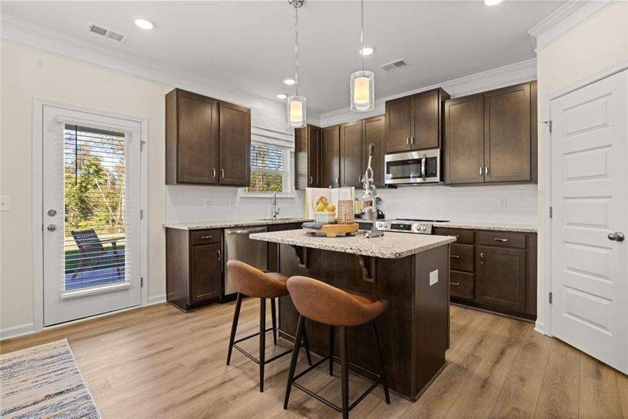 Furnished interior view inside a new home in Summerfield Place, Carrollton (Image 5).
