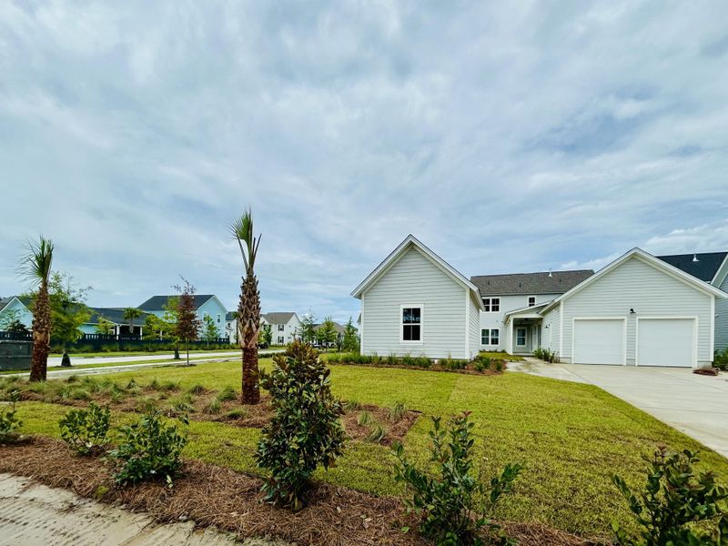 Front exterior of a new home in The Domus Collection at Midtown Nexton, Summerville, SC, highlighting curb appeal (Image 2).