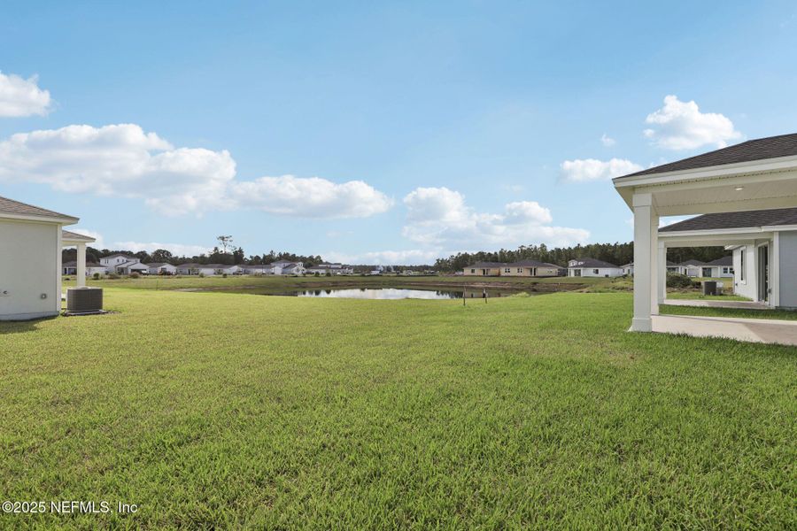Exterior details and patio area of a home in Lakes at Bella Lago - Signature Series, Green Cove Springs (Image 20).