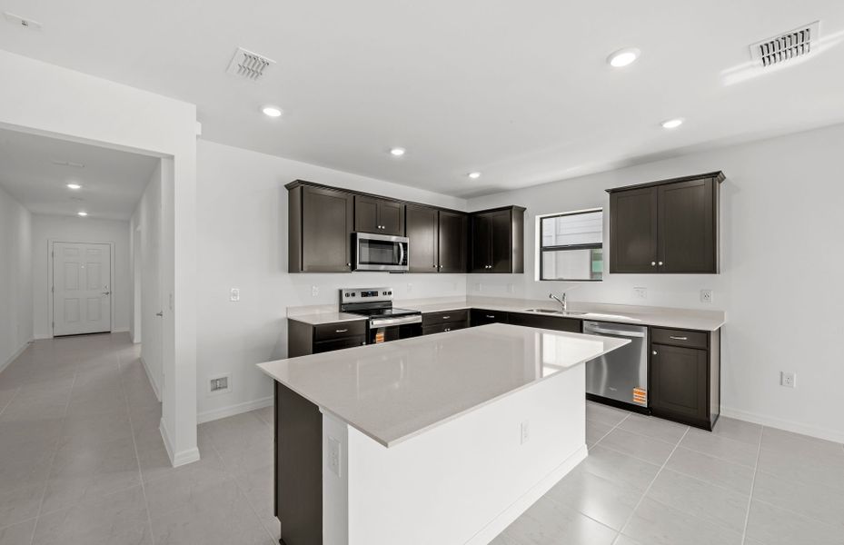 Furnished interior view inside a new home in Whispering Lakes, Lehigh Acres (Image 14).