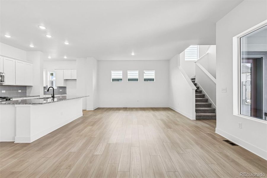 Spacious, unfurnished interior of a new home in Painted Prairie Cottage, Aurora (Image 19).