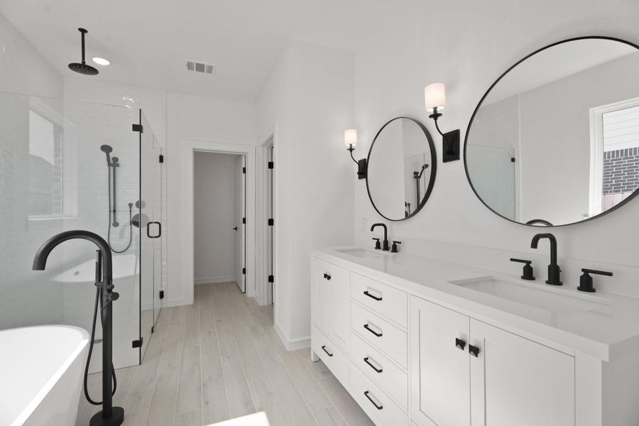 Luxurious primary bath (*Photo not of actual home and used for illustration purposes only.) Luxurious primary bath (*Photo not of actual home and used for illustration purposes only.)