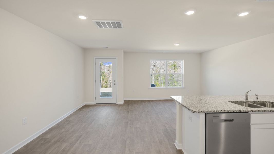Representative unfurnished interior of a home built from the Pearson by D.R. Horton in The Townes at Ridgewood Farms, Winterville (Image 17).