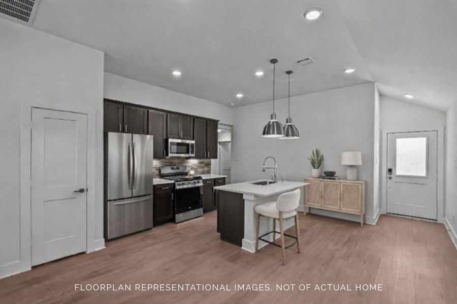 Furnished interior view inside a new home in Lone Star Landing, Montgomery (Image 7).
