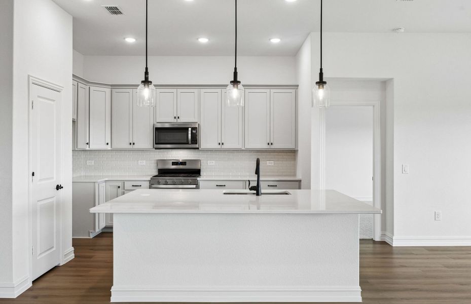 Furnished interior view inside a new home in Ribbonwood, Aubrey (Image 8).
