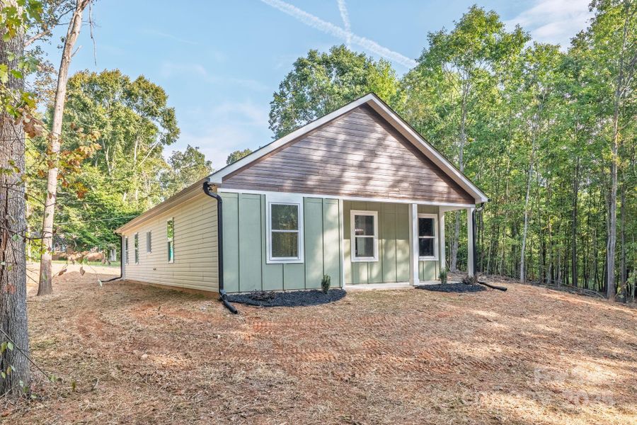 Front exterior of a new home in , Shelby, NC, highlighting curb appeal (Image 1).