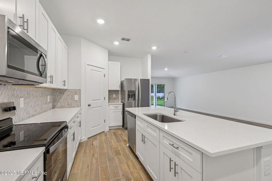 Furnished interior view inside a new home in Azalea Creek, Jacksonville (Image 5). Furnished interior view inside a new home in Azalea Creek, Jacksonville (Image 5).