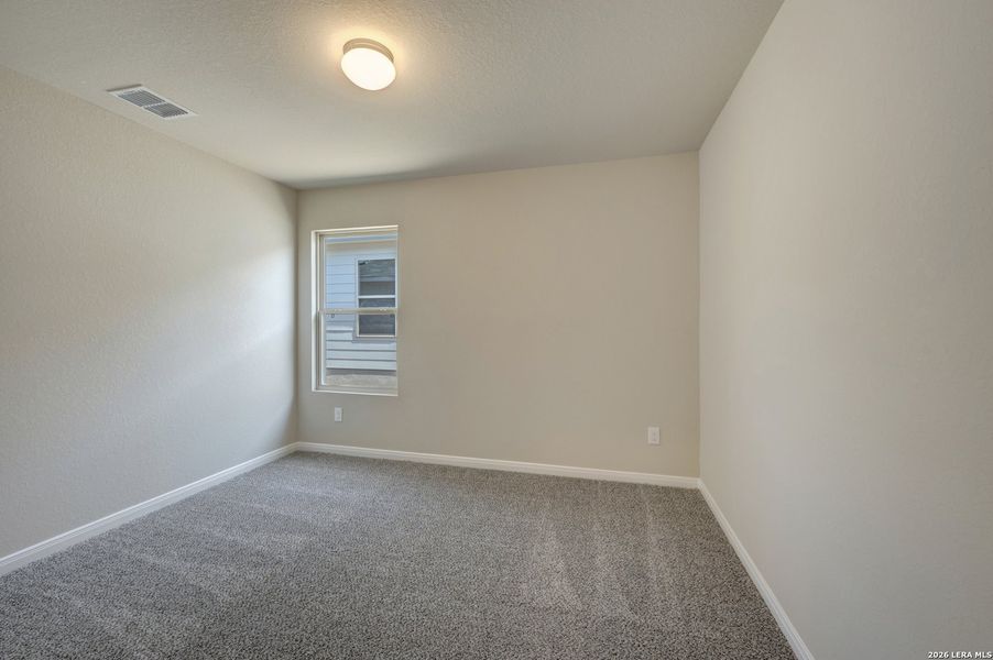 Spacious, unfurnished interior of a new home in Hunters Ranch, San Antonio (Image 29).