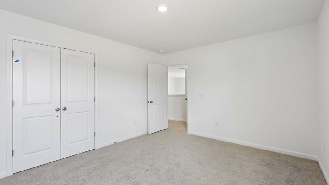 Representative unfurnished interior of a home built from the Manning by D.R. Horton in Laurel Oaks, Sanford (Image 31). Representative unfurnished interior of a home built from the Manning by D.R. Horton in Laurel Oaks, Sanford (Image 31).