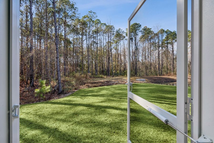 Exterior details and patio area of a home in Hidden Ponds Reserve, Awendaw (Image 23).