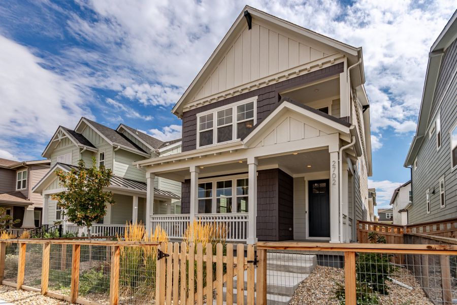Front exterior of a new home in Arras Park, Thornton, CO, highlighting curb appeal (Image 24). Front exterior of a new home in Arras Park, Thornton, CO, highlighting curb appeal (Image 24).
