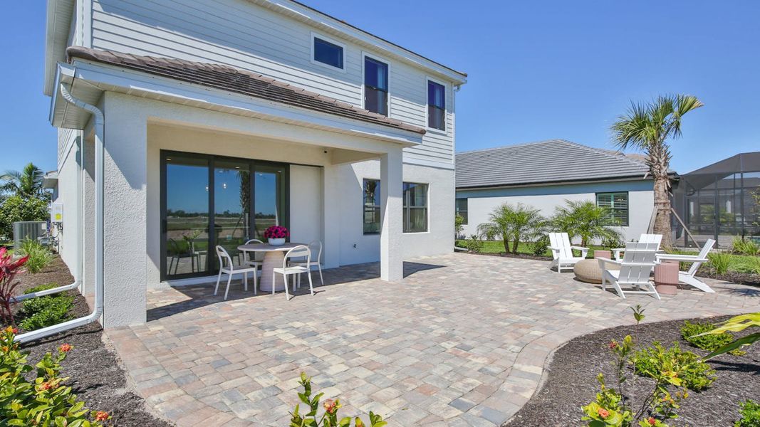 Exterior details and patio area of a home in Palm Grove, Lakewood Ranch (Image 1). Exterior details and patio area of a home in Palm Grove, Lakewood Ranch (Image 1).