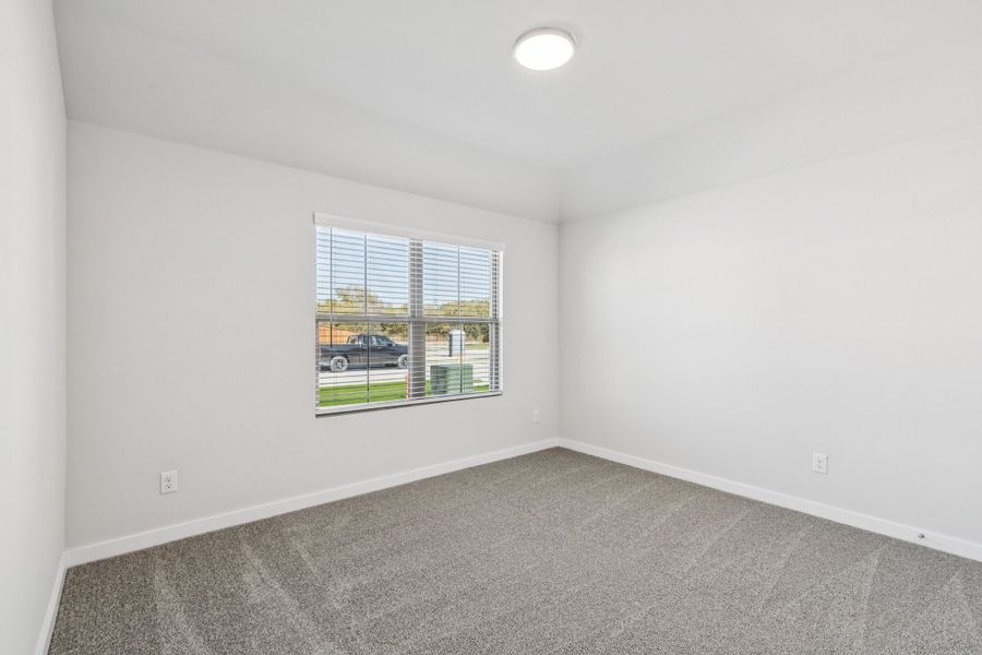 Bedroom in the Oscar home plan by Trophy Signature Homes – REPRESENTATIVE PHOTO Bedroom in the Oscar home plan by Trophy Signature Homes – REPRESENTATIVE PHOTO