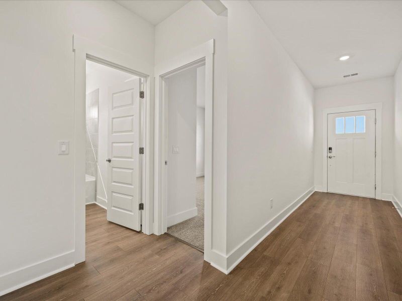 Spacious, unfurnished interior of a new home in The Coves at Lakes of Cane Bay, Summerville (Image 19). Spacious, unfurnished interior of a new home in The Coves at Lakes of Cane Bay, Summerville (Image 19).