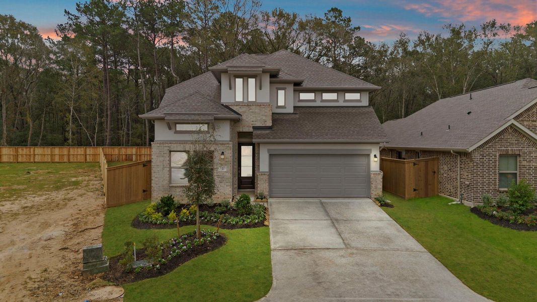 Front exterior of a new home in The Highlands, Porter, TX, highlighting curb appeal (Image 20).