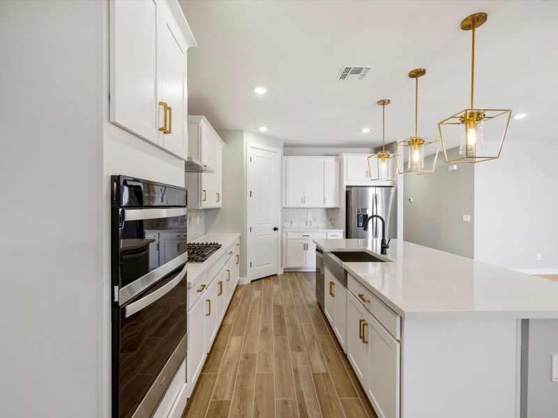 Furnished interior view inside a new home in Blossom Rock Reserve Series, Apache Junction (Image 2). Furnished interior view inside a new home in Blossom Rock Reserve Series, Apache Junction (Image 2).
