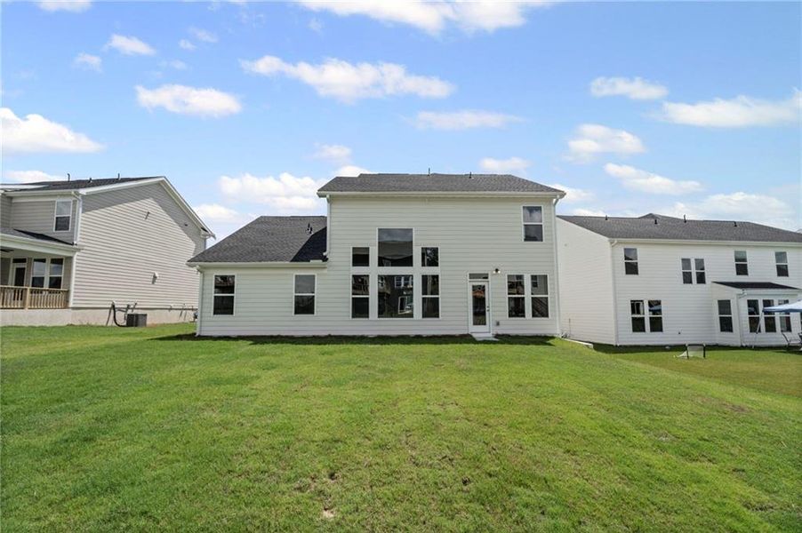Front exterior of a new home in Twin Lakes, Hoschton, GA, highlighting curb appeal (Image 2).