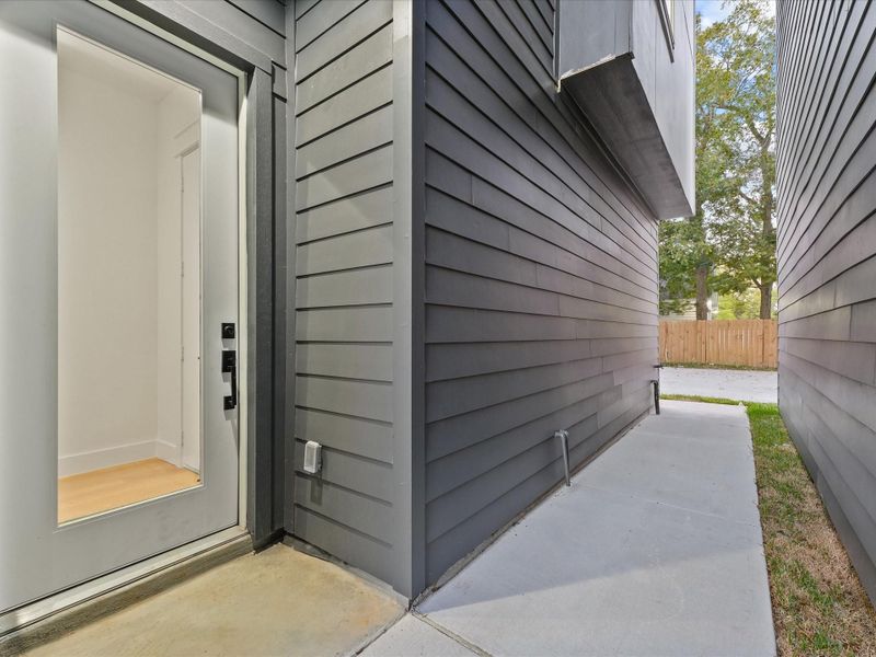 Exterior details and patio area of a home in , Houston (Image 3).