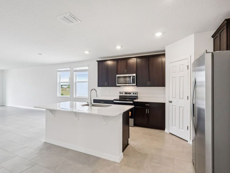 Furnished interior view inside a new home in The Meadow at Crossprairie, St. Cloud (Image 4).