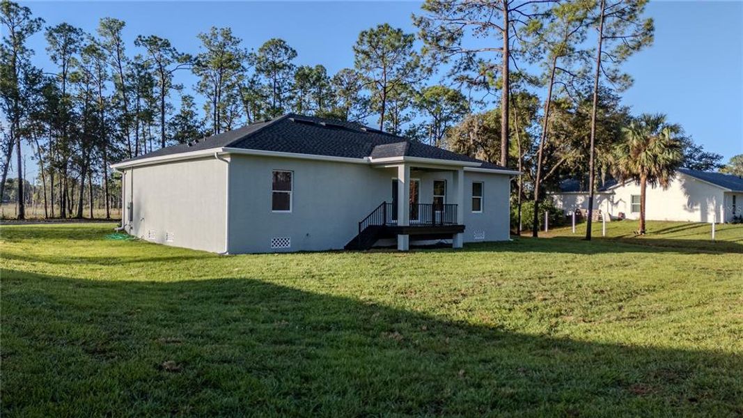 Exterior details and patio area of a home in , Deltona (Image 17).