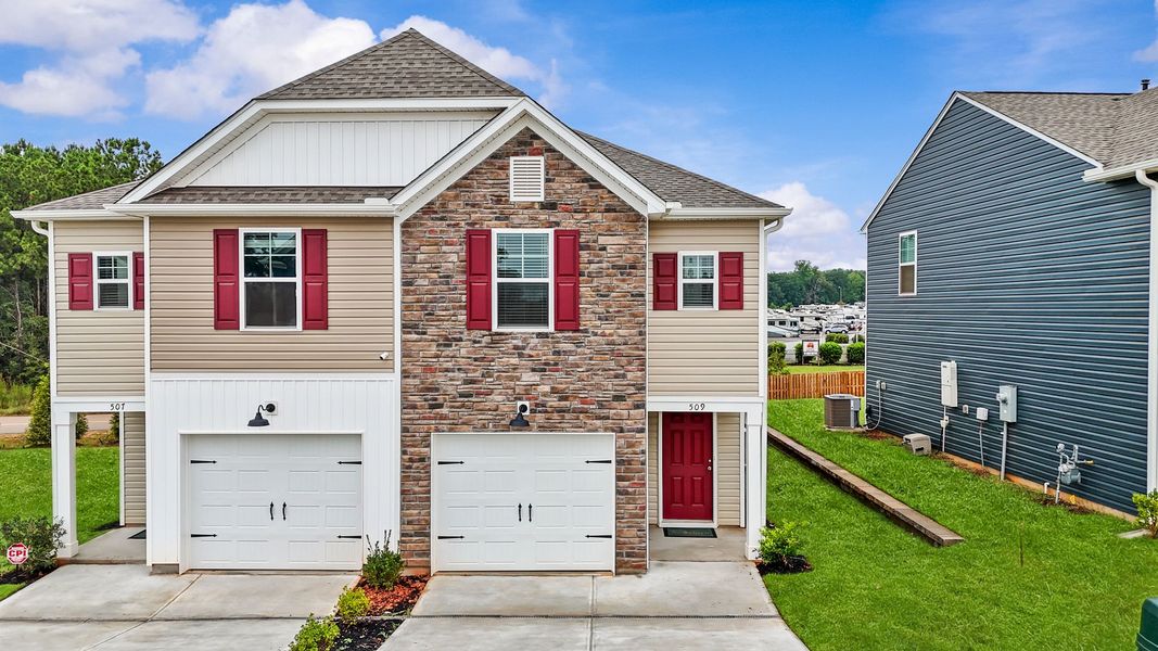 Front exterior of a new home in Champions Village at Cherry Hill, Pendleton, SC, highlighting curb appeal (Image 29).