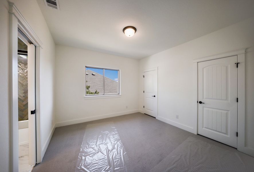 Representative unfurnished interior of a home built from the The Travis by Whitestone Custom Homes in Johnson Ranch, Bulverde (Image 52).
