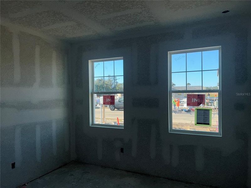 In-progress construction of a new home in Oakfield Trails Signature, Parrish, FL (Image 21).