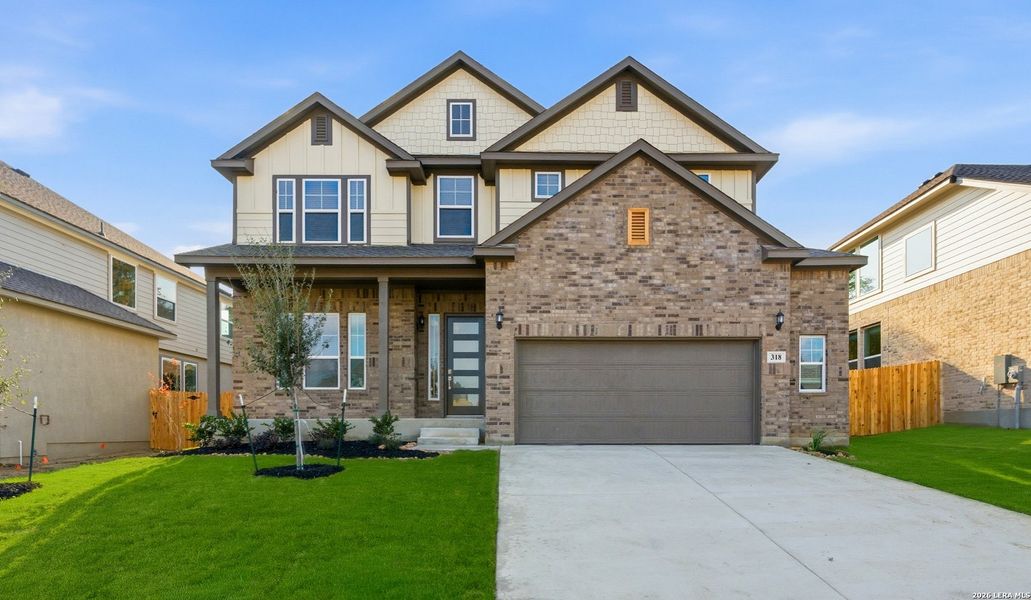 Front exterior of a new home in Buffalo Crossing, Cibolo, TX, highlighting curb appeal (Image 1). Front exterior of a new home in Buffalo Crossing, Cibolo, TX, highlighting curb appeal (Image 1).