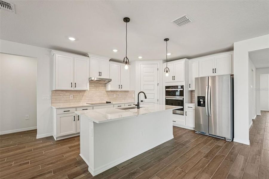 Furnished interior view inside a new home in Oakfield Trails - Signature Series, Parrish (Image 11).