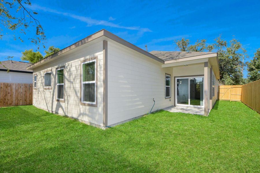 Exterior details and patio area of a home in , Houston (Image 24).