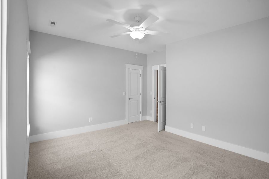 Spacious, unfurnished interior of a new home in Osprey Landing, Southport (Image 33).