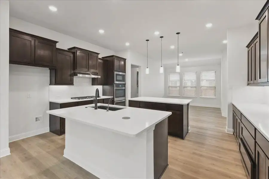 Representative furnished interior of a home built from the Springport by Chesmar Homes in Canyon Falls, Argyle (Image 12).