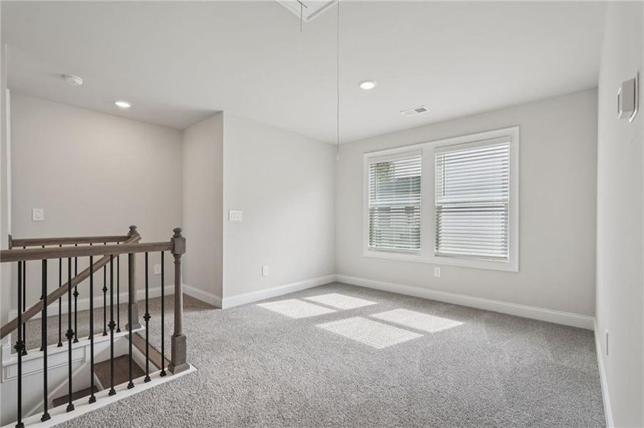 Spacious, unfurnished interior of a new home in Hemingway - Reserve Series, Cumming (Image 40).