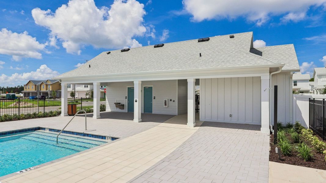 Exterior details and patio area of a home in Cyrene at Harmony, St. Cloud (Image 29).