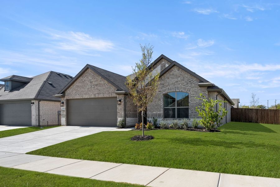 Front exterior of a new home in Summer Crest, Fort Worth, TX, highlighting curb appeal (Image 22). Front exterior of a new home in Summer Crest, Fort Worth, TX, highlighting curb appeal (Image 22).