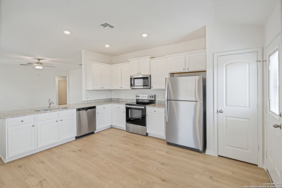 Furnished interior view inside a new home in Preserve at Medina, Von Ormy (Image 9).